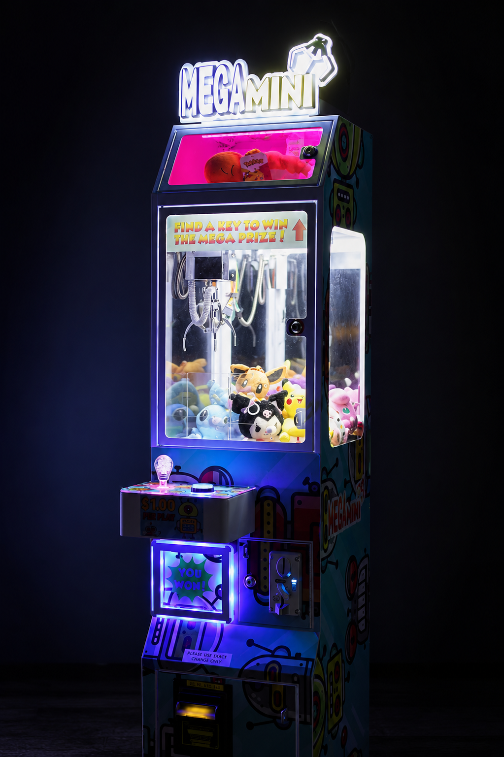 Studio photograph of a Mega Mini claw machine glowing against a dark background