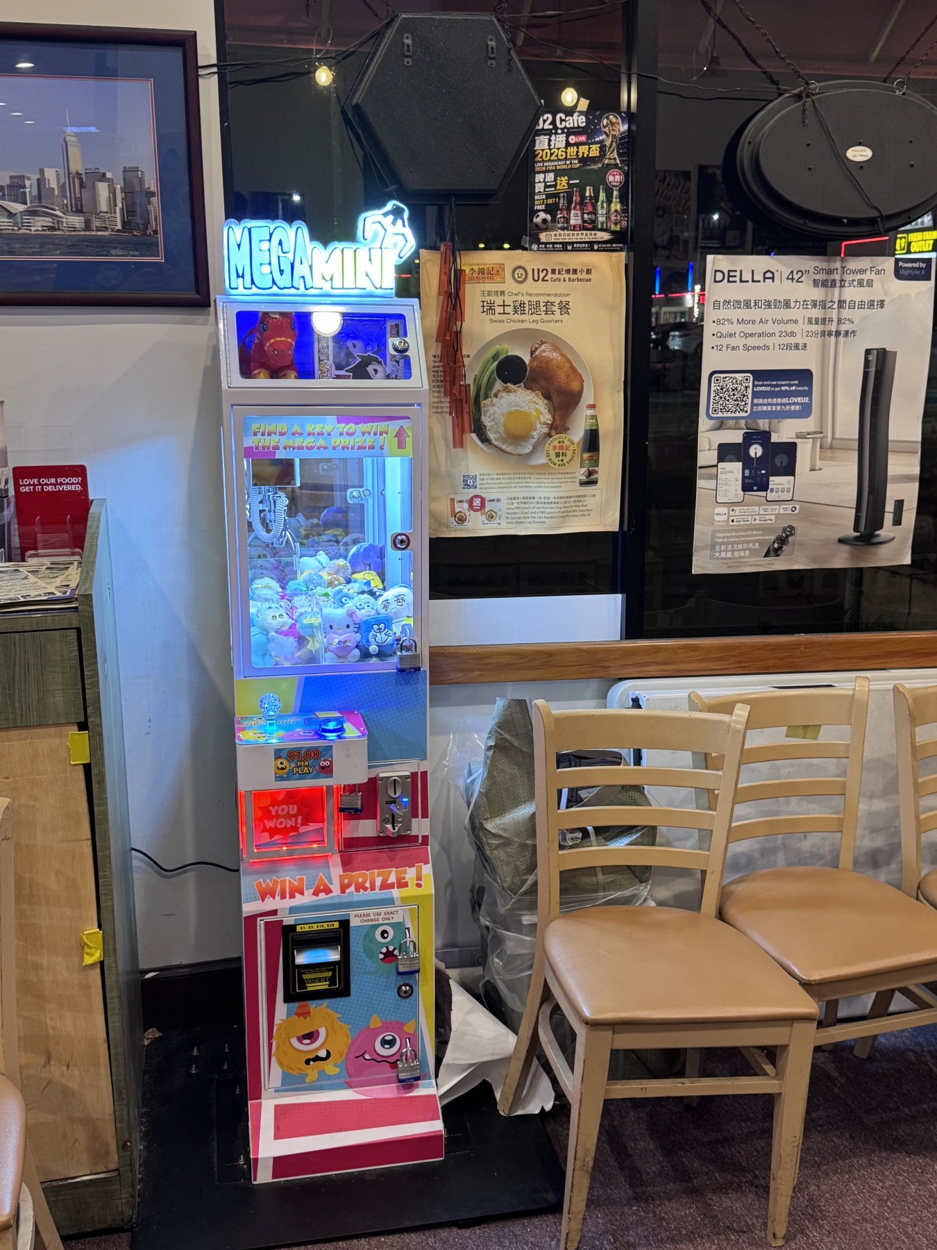 Mega Mini claw machine placed inside U2 Cafe and BBQ